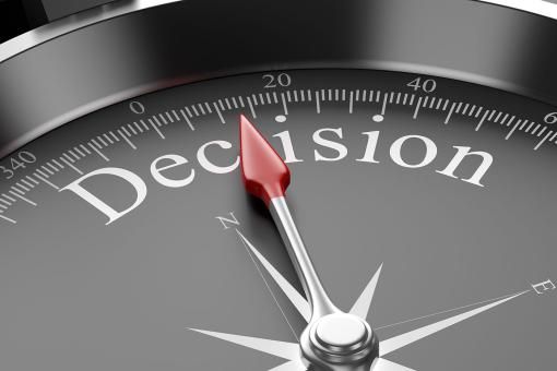 Compass pointing to the word "Decision"