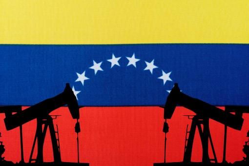 Oil pump on the background of the flag of Venezuela. Oil pump silhouette.