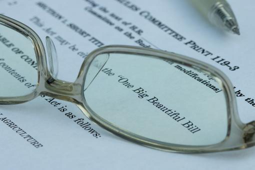 Closeup of the documents of the One Big Beautiful Bill Act (OBBBA), a budget reconciliation bill in the 119th United States Congress.
