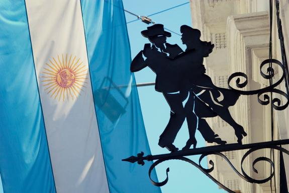Argentina flag and tango dancers