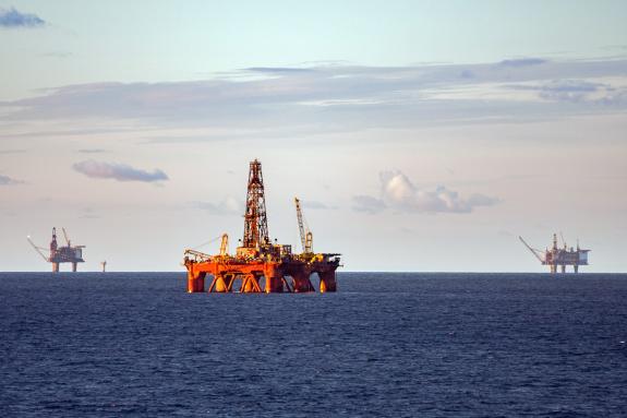 Oil rig production platforms at sea